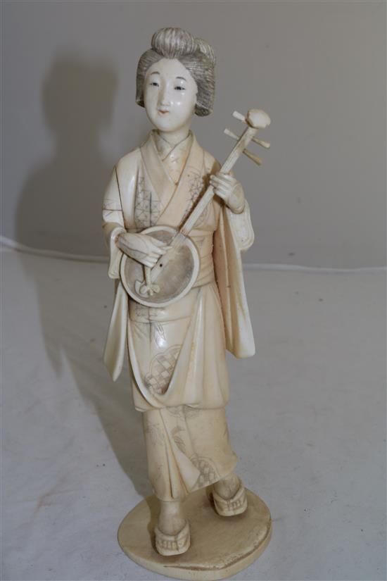 A Japanese sectional ivory figure of a bijin, early 20th century, 26.5cm